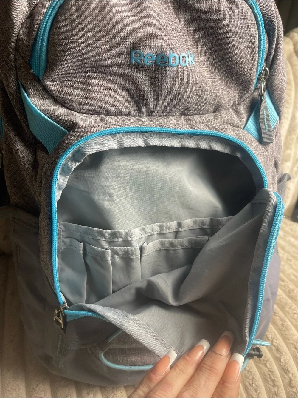 Reebok Gray Backpack with Teal Accents